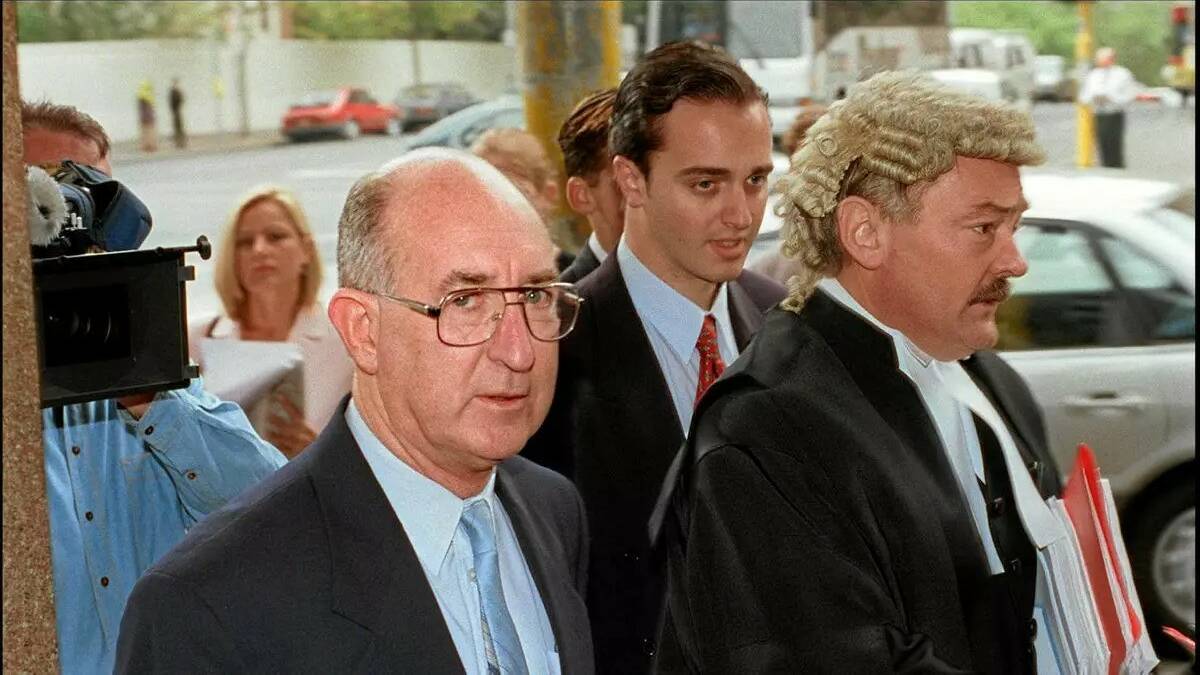 Convicted paedophile and Christian Brother Robert Best with his legal team. File picture