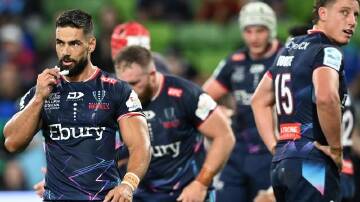 The Melbourne Rebels play on Friday night, shortly after creditors vote on the club's future. (James Ross/AAP PHOTOS)