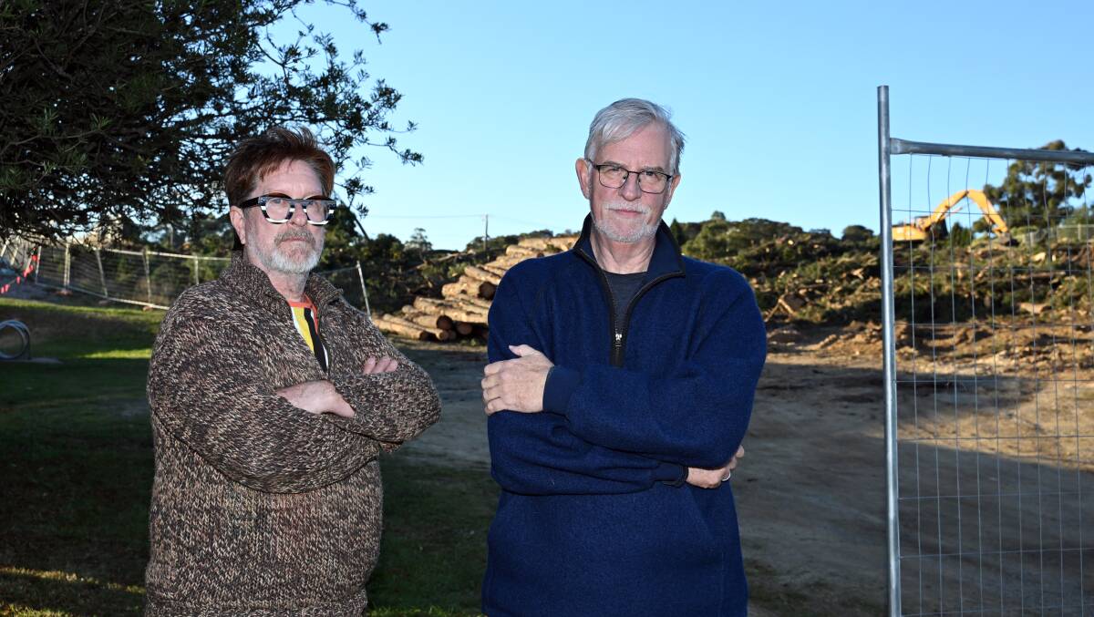 Black Hill residents John Wrigglesworth (left) and Julian Whitta at the site of the removed pine trees. Picture by Kate Healy