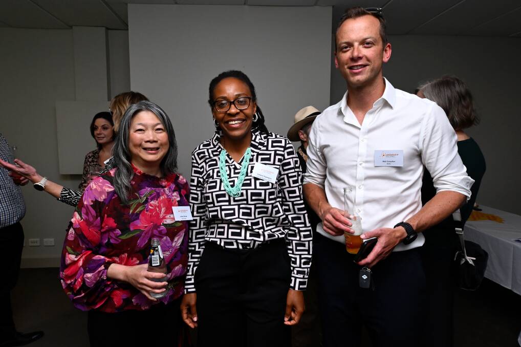 Linda Wong, Evelyne Nyamwiza and Rob Croucher at the Future Shapers community Impacts showcase in 2023. Picture by Adam Trafford