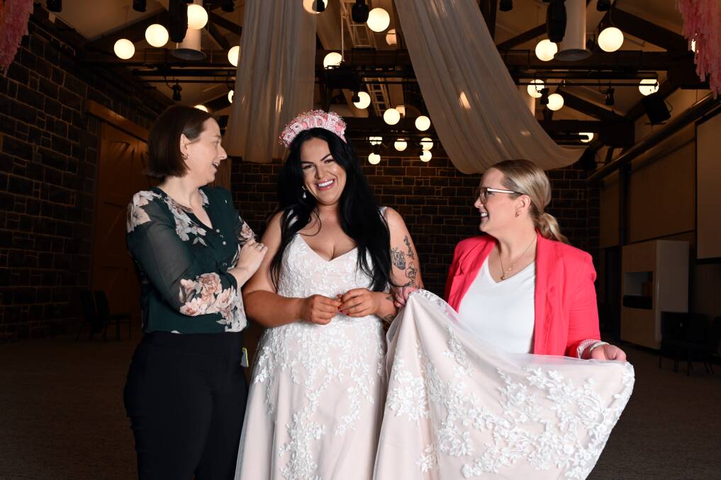 Mandy Grant, Brittany Fontana and Laura Feldman preparing for the 2023 Wedding Expo. Picture by Kate Healy