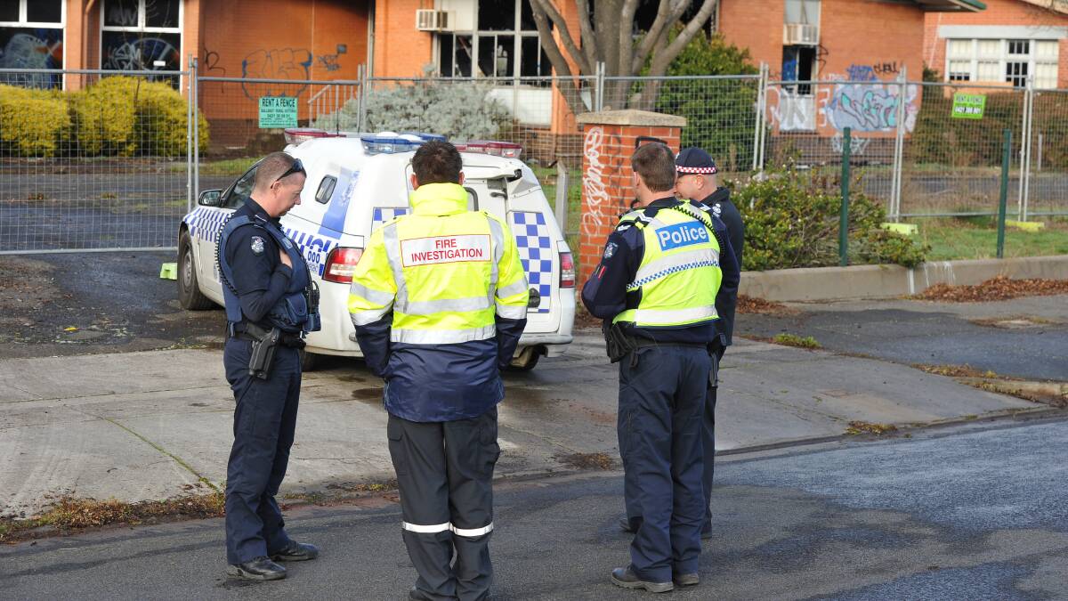 INVESTIGATE: Ballarat Police and CFA investigators at the scene of the old Damascus College site on Wednesday morning. Picture: Lachlan Bence.