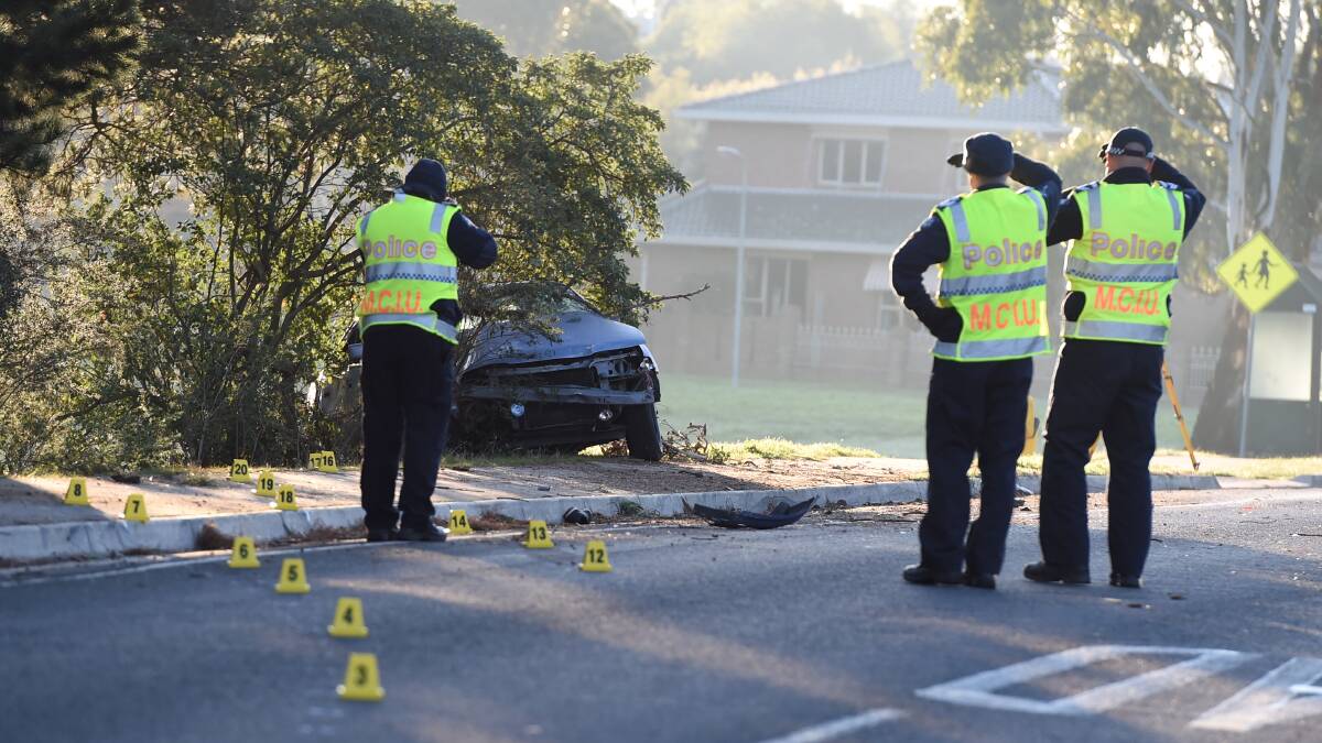 CRASH: Police at the scene of the Black Hill fatality on Tuesday morning. PICTURE: LACHLAN BENCE