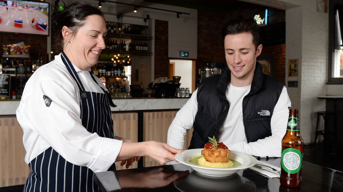 PIE TIME: The Western Hotel head chef Belinda Underwood gives Sam Palanca a serve of their slow cooked lamb pie. Picture: Kate Healy. 