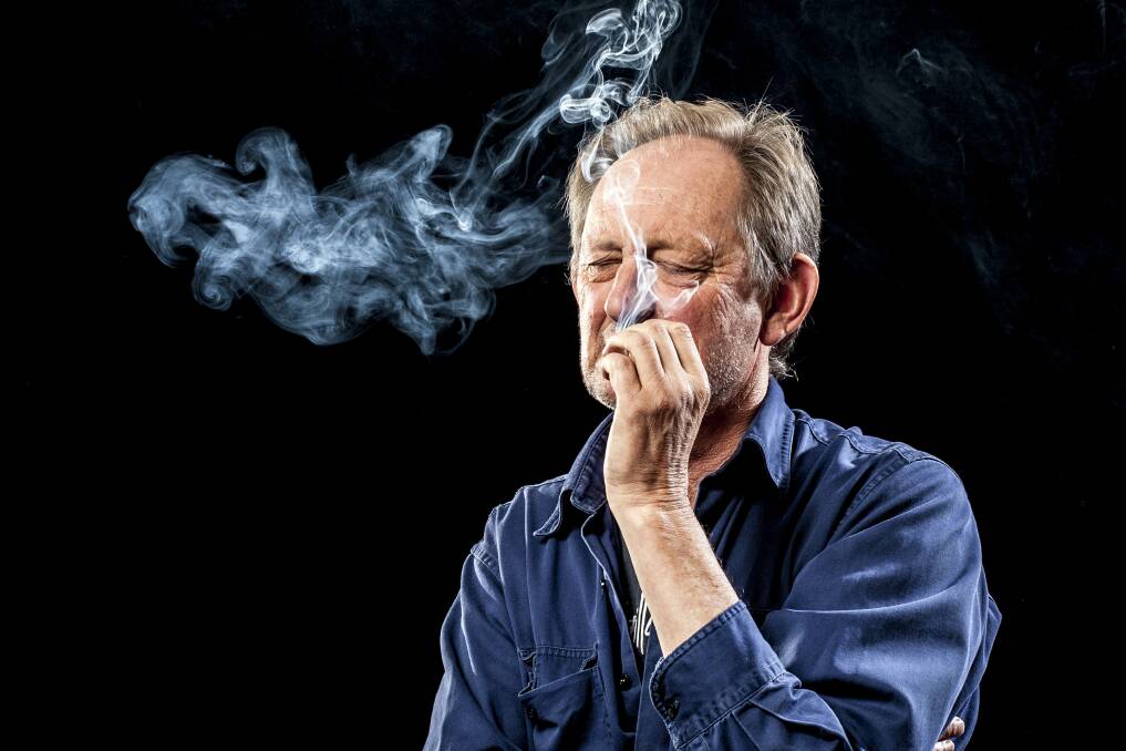 SMOKING HOT: Photographer Ben Wrigley's photo A Man Smokes features as part of his exhibition The Dream Machine at the Ballarat International Foto Biennale core program.