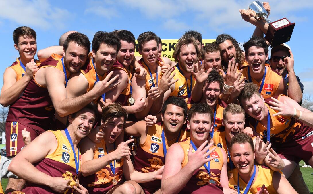 REIGNING CHAMPS: The Redan reserves celebrate their third straight flag last year. Can they make it four in a row?