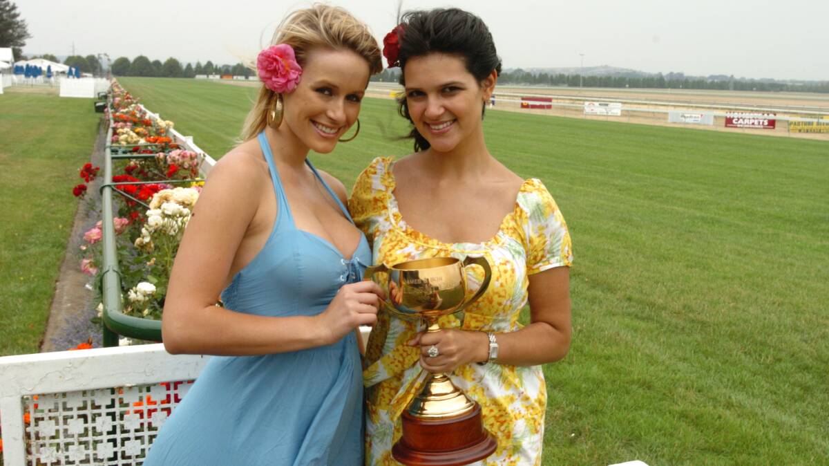 Sarita Stell and Danielle Atkin from Model Behavior brave the wind at Dowling Forrest with the Ballarat Cup in 2006.