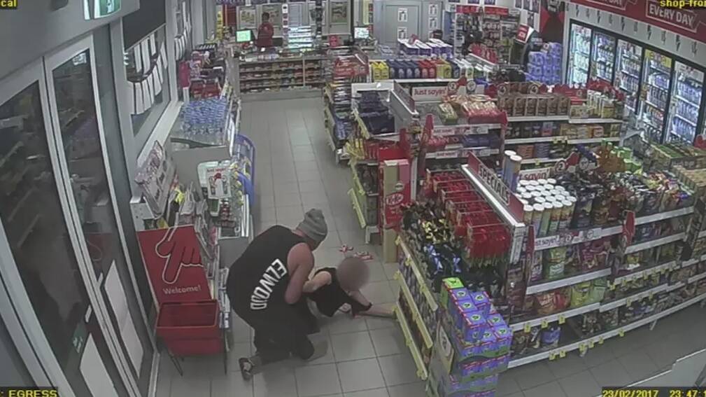 An image from CCTV footage of Josevski dragging his girlfriend out of the service station.

Photo: Supplied