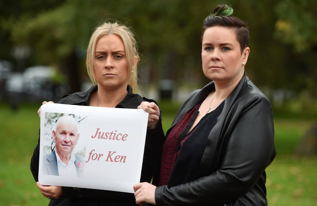 Ken's granddaughters Courtney Pearce and Leah Handford with the petition. Picture: Lachlan Bence​