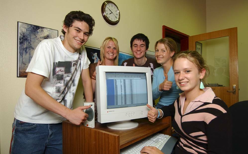 2005 - Year 12 graduates check VTAC scores and uni places on the web: Alex McMahon , Kate Sykes, Brett McLoughlin, Grace McDonald, Meg Sutherland at keyboard.