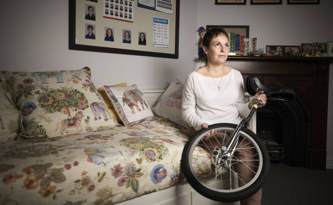 Jaala Pulford MP in her daughter Sinead's room, holding Sinead's unicycle.
