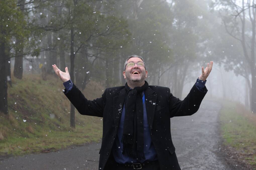 The Courier reporter Greg Gliddon at the top of Mt Warrenheip, experiencing snowfall for the first time. Photo: Kate Healy.