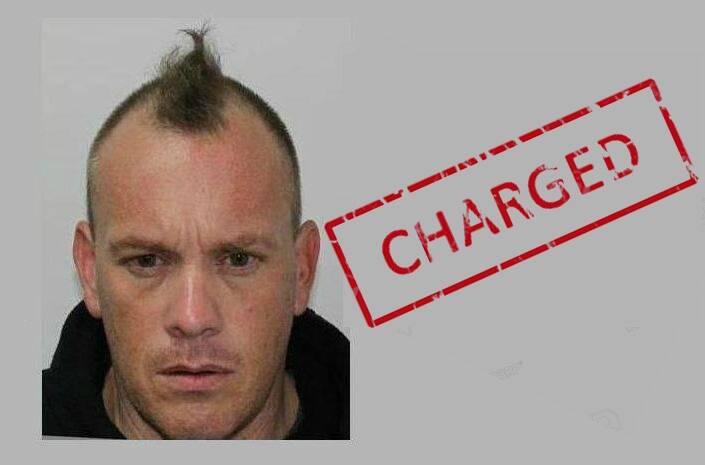 Manhunt suspect charged and fronts court