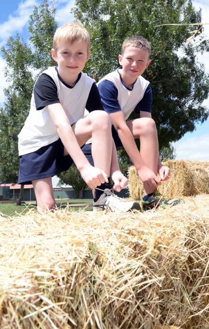 SUPPORT: St Brendan's Primary School grade six pupils Callan McKay and Campbell Leonard are raising money for hay for drought impacted farmers. Picture: Kate Healy.   