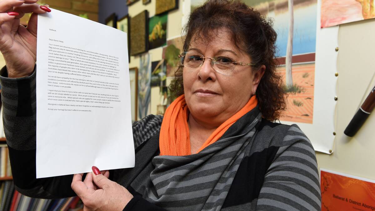 BADAC chief executive Karen Heap with a copy of the racially offensive letter. Picture: Lachlan Bence 