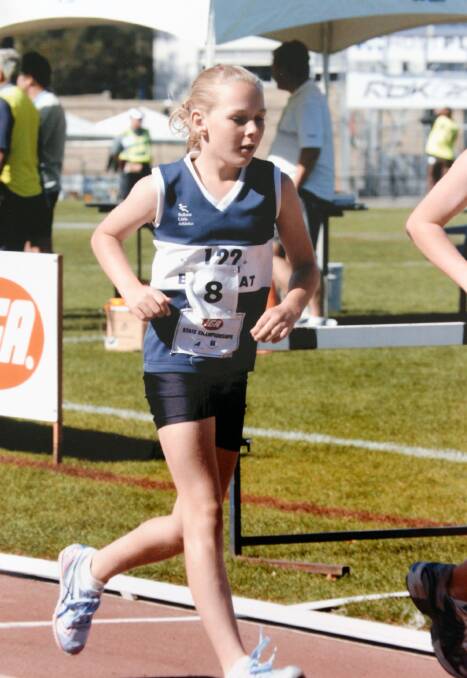CHASING HER DREAMS: Rachel Tallent races as a young child at the YCW Little Athletics Club.