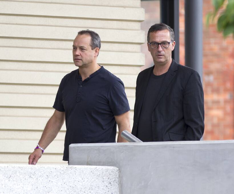 HARROWING: Ballarat clergy abuse survivors and former St Patrick's College students Peter Blenkiron and David Ridsdale leave the sex abuse inquiry on Monday after hearing harrowing evidence from former students.  