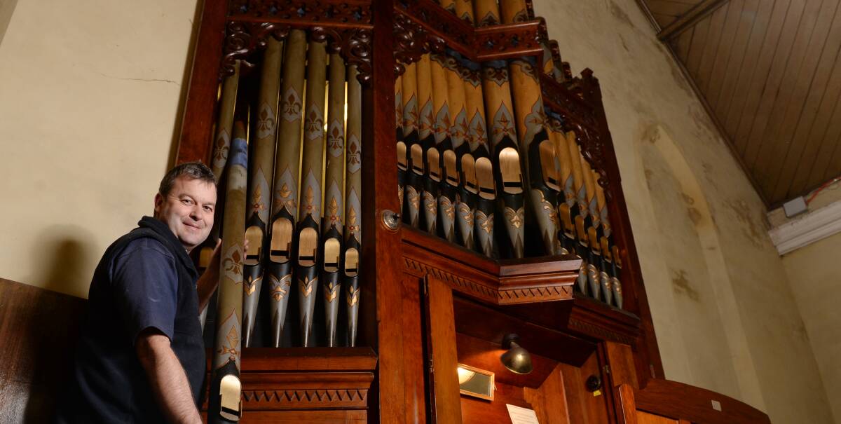 NEW BEGINNINGS: Organ builder Campbell Hargraves is restoring the Barkly Street Uniting Church's 1800's pipe organ before it is moved to the St John's Anglican Church in Creswick. Picture: Kate Healy. 