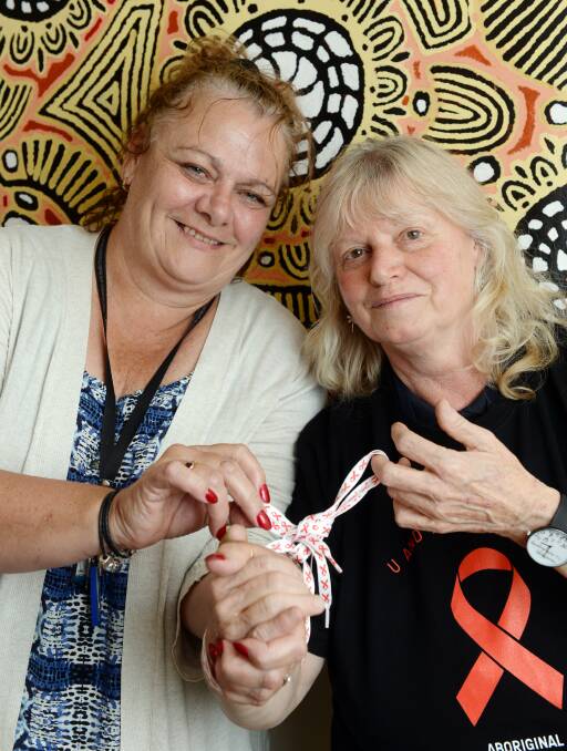 WORKING TOGETHER: BADAC dual diagnosis nurse Marie Degrazia and Ballarat Community Heath sexual health nurse Jenny Morrison. Picture: Kate Healy.
