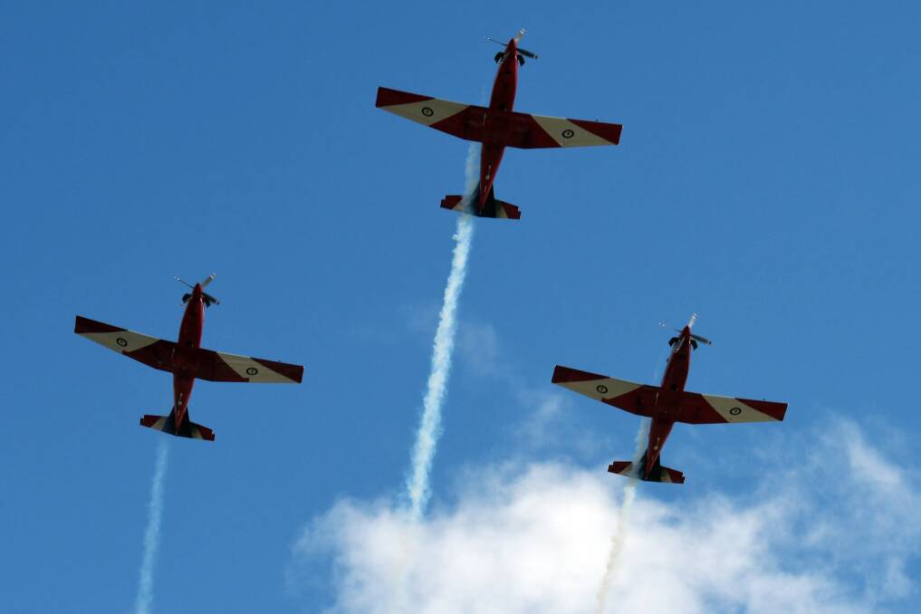 BIG FLIGHT: The Roulettes flyover marked the 77th anniversary of the Battle of Britain. Picture: Kate Healy