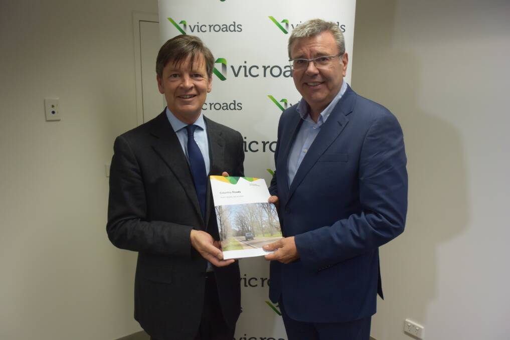 State government Roads Minister Luke Donnellan and VicRoads chief executive John Merritt.