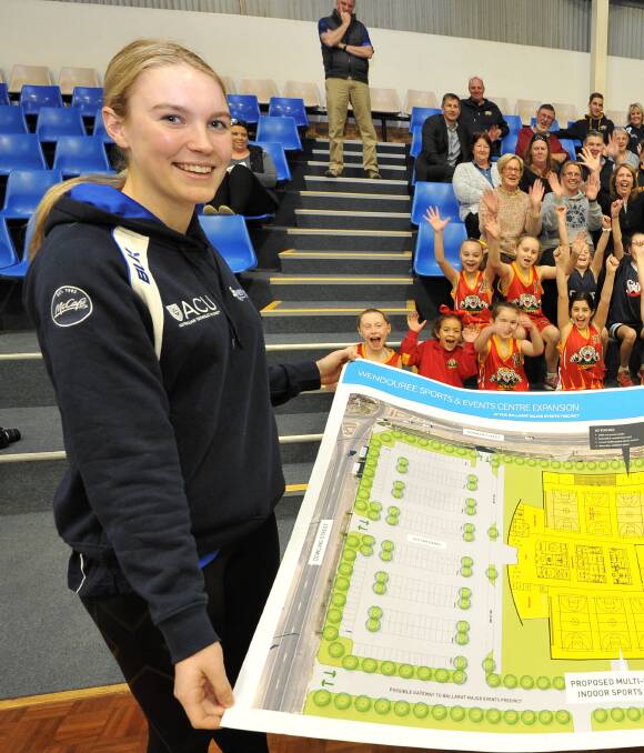 NEW DESIGN: Edenhope netballer Sacha McDonald with plans for a new indoor sports stadium at Wendouree in June last year. Picture: Lachlan Bence