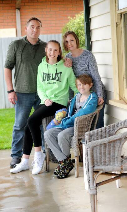 FAMILY TIES: Adrian, Ashlyn, 15, Tanya, and Caleb, 12, have the community rallying behind them after Caleb underwent open heart surgery. Picture: Samantha Camarri
