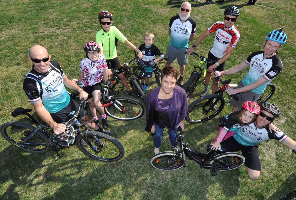Regional Development Minister Jaala Pulford with Creswick mountain bike riders. Picture: Lachlan Bence