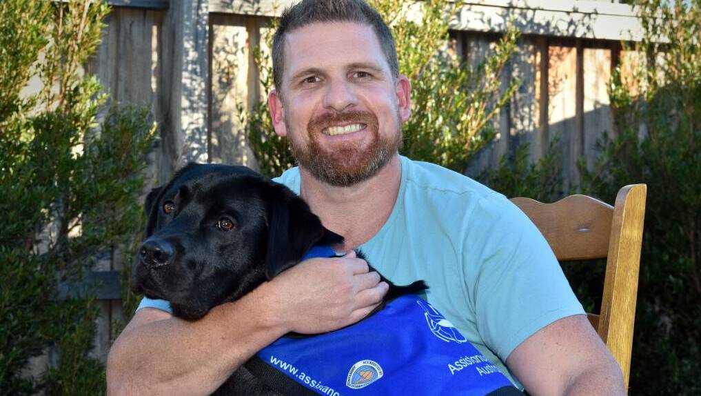 Life changing: Andrew Tebbit and his PTSD service dog Benji have a close bond. Photo: Ivan Sajko