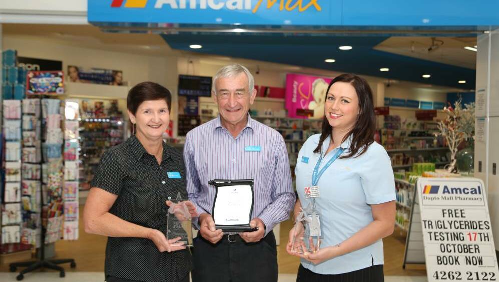 End of an era: Anne McQueen, Peter Abba and Sarah Burton at Amcal Max Dapto. Picture by Greg Ellis.