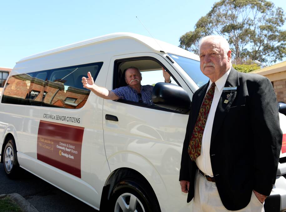 NEW BUS: Creswick Senior Citizens Club president Bryan Reasons and chairman of the Creswick and District Community Bank Graeme Mitchell. Picture: Dylan Burns. 