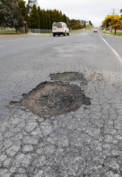 ROUGH: Fixing potholes across the region will be one of the keys to a funding boost by the state government. Picture: Kate Healy. 