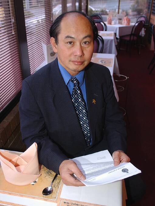 REMEMBERED: Henry Thai shortly after receiving his Order of Australia in 2002. 