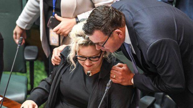 Premier Daniel Andrews congratulates Health Minister Jill Hennessy after the bill was passed. Photo: Justin McManus
