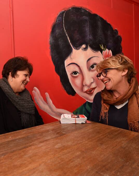 Helping hand: UnitingCare housing and crisis support manager Wendy Ferguson and Eclectic Tastes owner Margo Pettit. PICTURE: Lachlan Bence