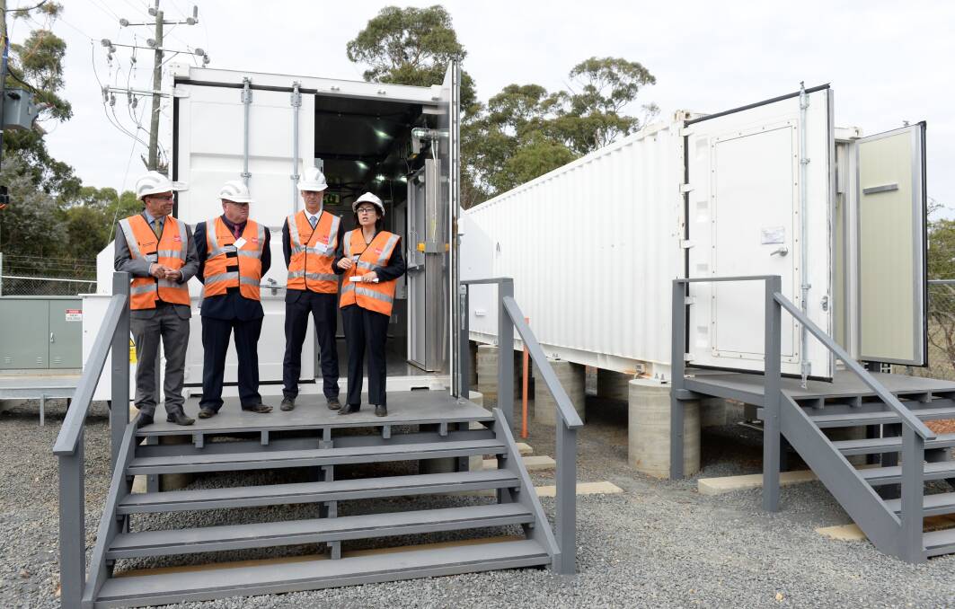Geoff Howard,  Des Hudson, Powercor electricity networks general manager Steven Neave and Energy Minister Lily D'Ambrosio at the battery's launch last month. PICTURE: Kate Healy