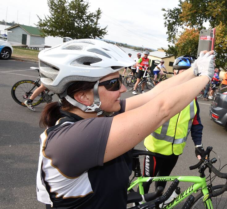 Over 200 cyclists did a lap of the lake on Thursday to show their support for Christian Ashby and call for greater safety on the road. Pictures by Lachlan Bence