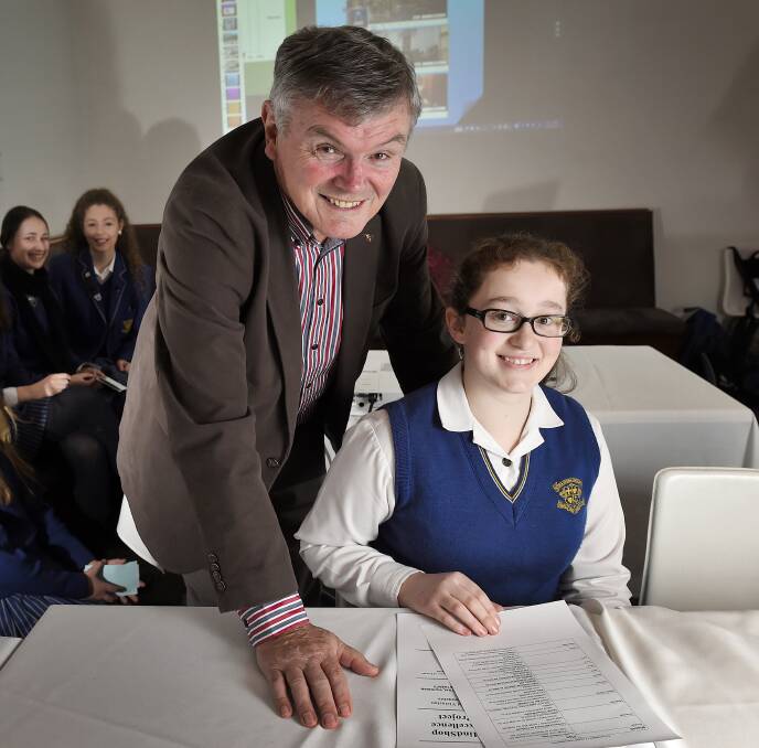 Strategy: Mindshop founder and chairman Chris Mason and Loreto College student Lauren Brodie, as Sam Crebbin and Olivia Arnts look on. PICTURE: Luka Kauzlaric