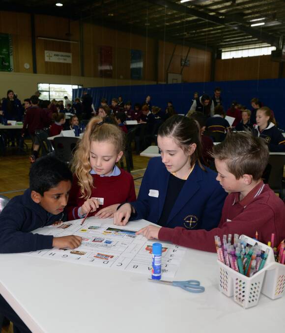 Numerous:  Grade four pupils Timothy Mani (Emmaus Catholic Primary School), Eloise Leonard (St Francis Xavier Primary), Jordan Hill (Damascus College) and Lachlan Charleson (St Alipius Parish School). Picture: Kate Healy