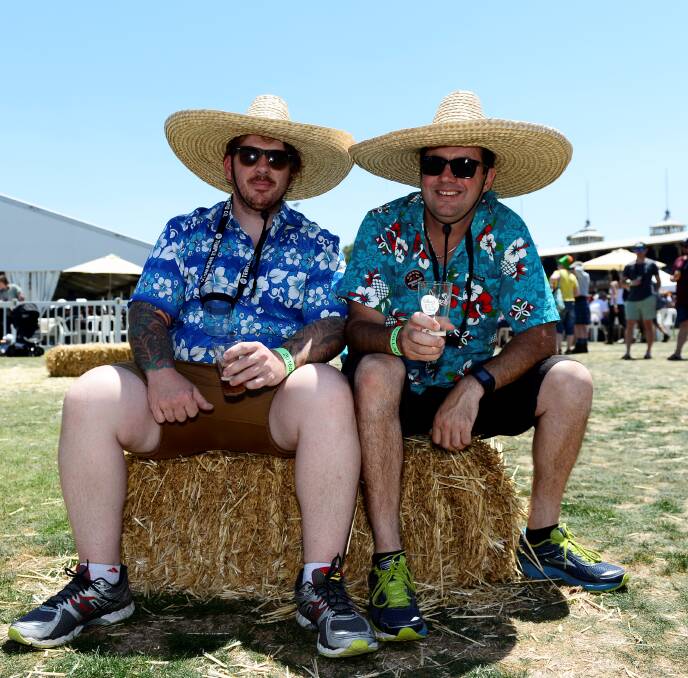 Hay guys: Sean Hellyar and Darren Watkins enjoying the music at Beerfest on Saturday afternoon. Bands played for most of the day. PICTURES: Dylan Burns
