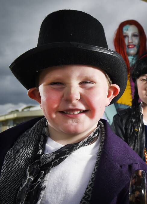 GRINNER: Toby Knight won the primary school Phoenix P-12 dress-up competition for National Book Week for his Willy Wonka costume.  PICTURE: Luka Kauzlaric 