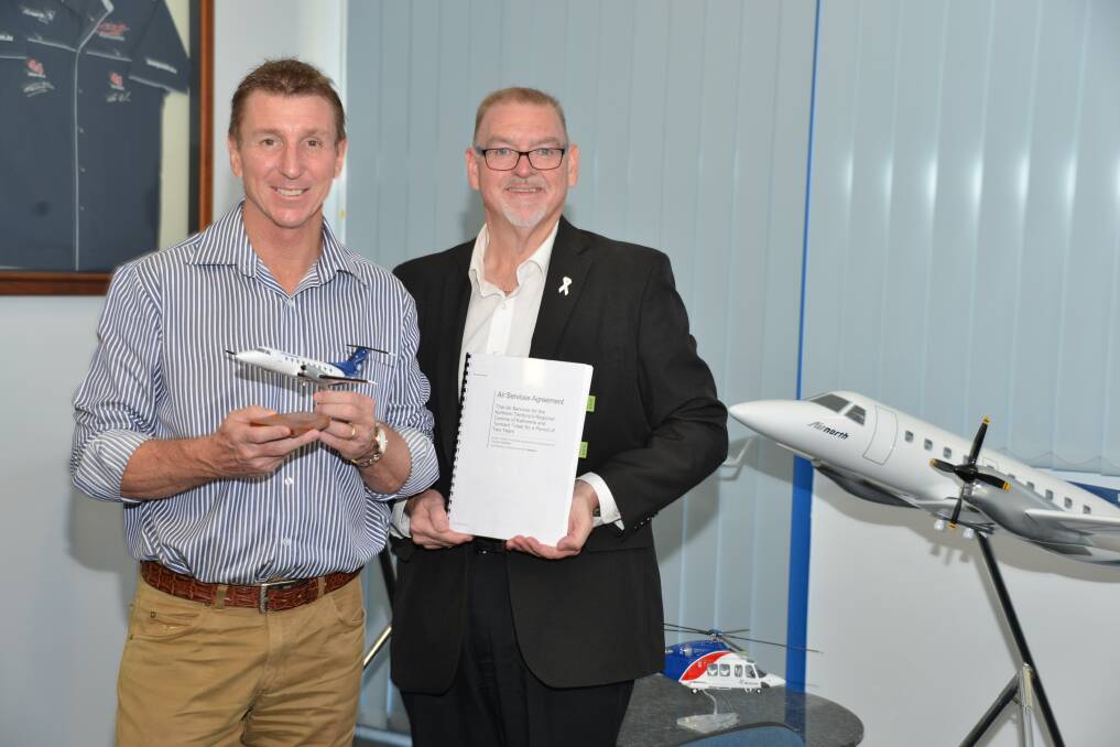 PLAN TAKES FLIGHT: Member for Katherine Willem Westra van Holthe and Transport Minister Peter Chandler celebrate the news that Airnorth will begin a long-awaited “milk run” linking Darwin with Katherine, Tennant Creek and Alice Springs next month.