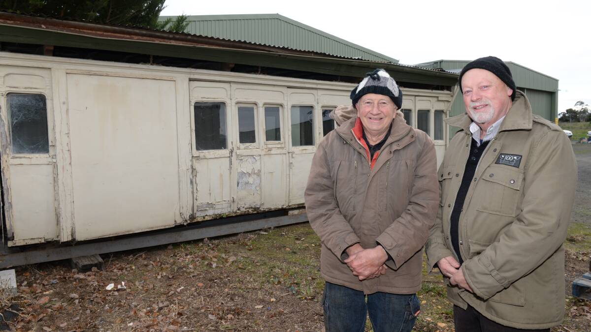John Smyth and Ron Harris with the 1884 Railway Carriage.PICTURE: KATE HEALY