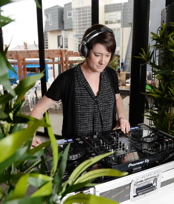 Art, music and food: Julie McLaren, aka DJ Spin Kitty, gets her decks ready for this year's first Tuck Truck Tuesday at Alfred Deakin Place, which aims to activate Ballarat's CBD. Picture: Kate Healy
