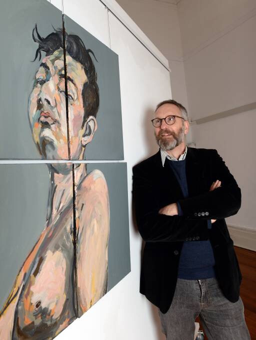 Who am I?: The Lost Ones gallery owner Stephen Pigott with Ballarat artist Alee Afzali's work 'Mirror Selfie'. Visitors are encouraged to take selfies. Picture: Kate Healy