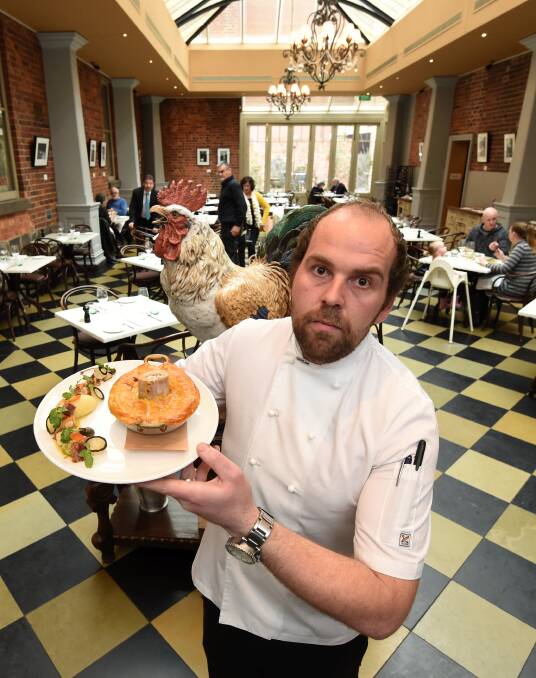 Passion for pies: Craig's Royal Hotel head chef Shannon Easton with his French ragout creation, complete with a "pie chimney". Picture: Lachlan Bence