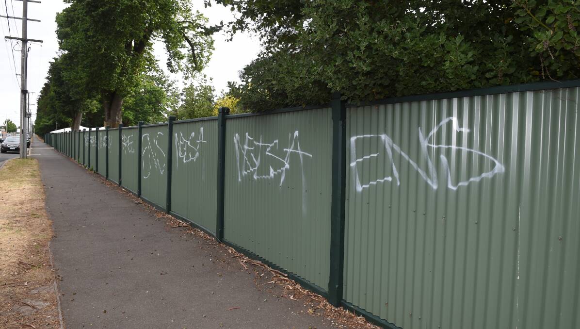 Unsightly: Taggers went on a graffiti spree on Tuesday night, defacing Lake Gardens walls and Botanical Gardens fences. Picture: Kate Healy