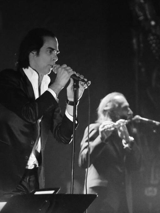Like birds of doom: Nick Cave and fellow Bad Seeds musician and collaborator, Warren Ellis, who hails from Ballarat. Picture: Nikolitsa Boutieros