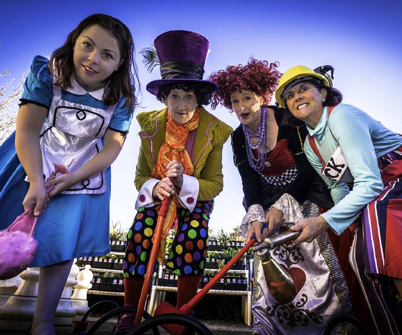 Cheshire smiles: Creswick Theatre Company actors Tessa Marshall, Carol Cole, Kate Bindu and Ellen Scott play some croquet ahead of the pantomime. Picture: Steve Demeye