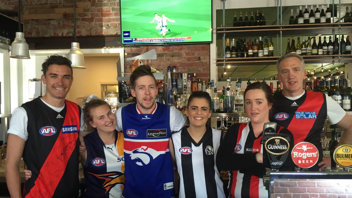 Footy fun: These guys may look like a super elite team of footballers, but in fact they're the friendly publicans at the Western Hotel. Picture: Amber Wilson.